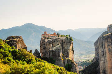 Fototapeta premium The monastery Meteora. Rocky monasteries complex in Greece near Kalabaka city. Monastery of the Holy Trinity