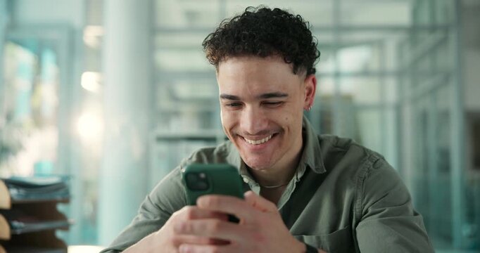 Laugh, flare and man in office with phone, funny text message or good news on email app. Happiness, bokeh and corporate employee in agency with tech, meme or internet comedy on social media.