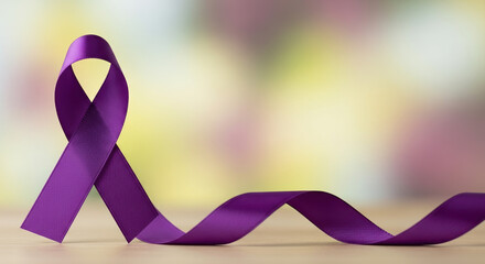 Epilepsy Awareness Month represented with purple ribbon on table, symbolizing support and understanding for those affected. Epilepsy Awareness Month highlights need for education, treatment access,