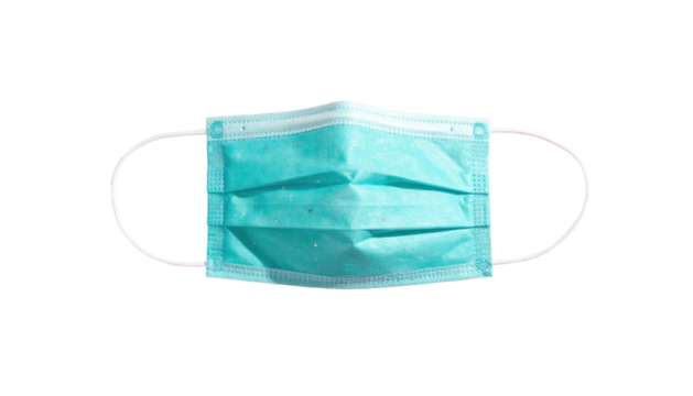 Light blue surgical mask with elastic straps on a black background, laying flat