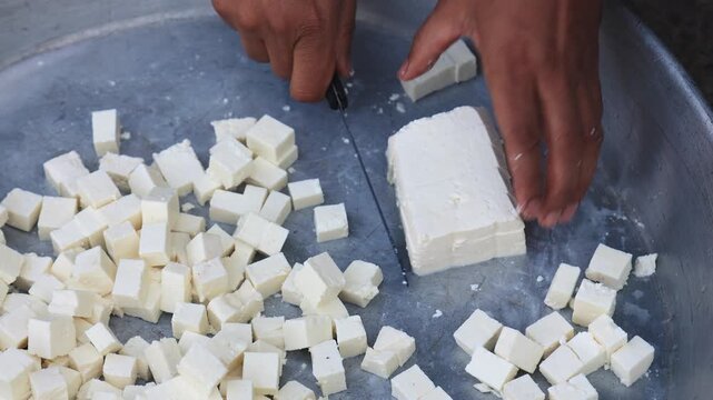 Cooking traditional Punjabi paneer for a village wedding celebration in Uttarakhand