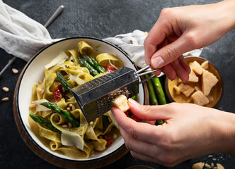 Vegetarian vegan green pasta, Fettuccine pasta with pesto sauce. Healthy food.