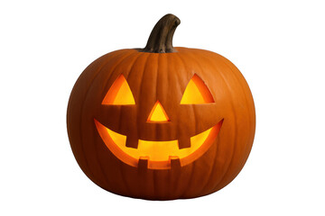 Fototapeta premium Jack-o'-lantern glowing with a carved spooky smile, symbolizing halloween celebration, autumn holiday, and festive decoration