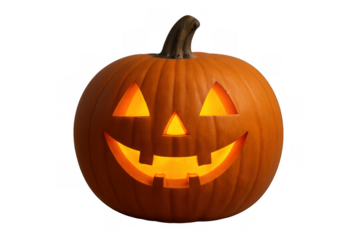 Jack-o'-lantern glowing with a carved spooky smile, symbolizing halloween celebration, autumn holiday, and festive decoration