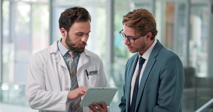 Doctor, tablet or men in hospital, discussion or healthcare with review for treatment. Medical service, support or professional in clinic, tech or feedback for diagnosis, digital app or communication