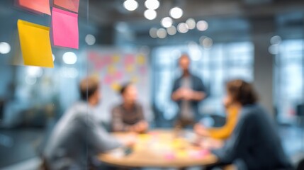 Team Strategy Session Blur - Blurred background of a brainstorming session among team members. High quality