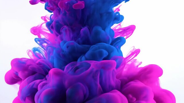 Blue and magenta ink mixing in water. An abstract colorful cloud of paint dissolving in liquid on a white background. Fluid art motion concept