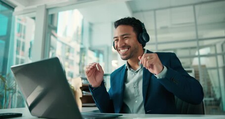 Man, headphones and dancing in office with laptop for business growth, music playlist or song. Low angle, person or audio in workplace with computer for revenue generation, streaming album or rhythm. - Powered by Adobe