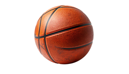 A round, textured, orange basketball floats on a black background