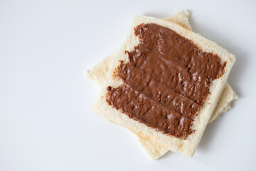 Close-up of white bread with chocolate jam