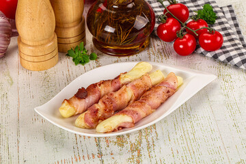 Hot mozzarella sticks with bacon