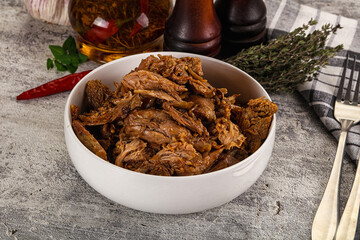 Shredded slow cooked pork meat