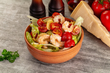 Tasty caesar salad with prawn