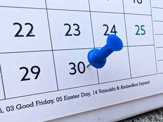 30th last date or day of month marked with push pin on calendar 2026 concept of business meeting...