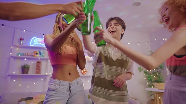 Group of diverse Generation Z friends enjoying a party in a cozy house.