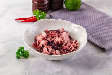 Marinated canned mini baby octopus