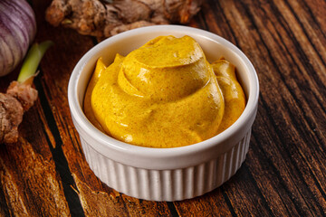 Indian yellow spicy curry sauce