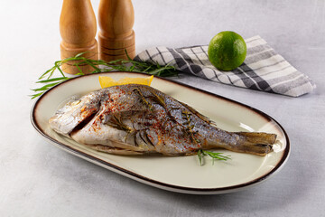 Baked dorada fish with spices