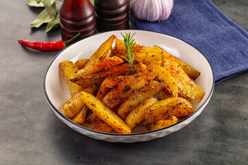 Baked crispy hot potato with rosemary