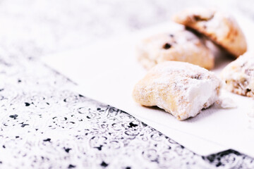 Stollen Bites on bright background. Soft focus. Close up. Copy space	