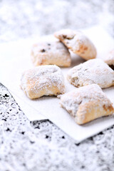 Stollen Bites on bright background. Soft focus. Close up. Copy space	