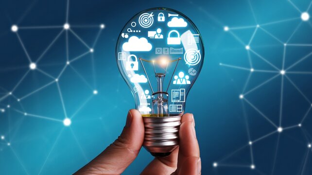 Innovative solution concept showcasing business intelligence icons inside glowing lightbulb held by hand on vibrant blue background