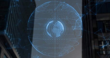 Projecting holographic point-cloud globe with inner sphere and rings in city canyon between towers