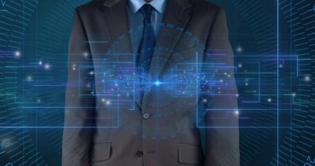 Showing adult male torso wearing dark suit and blue tie in studio, projecting holographic HUD node
