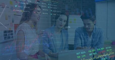 Analyzing three colleagues in office wear at laptop in meeting area with sticky notes, data overlay