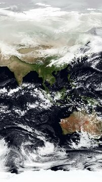 Equirectangular map of the precipitation on Asia and Oceania. Seamless animation. Vertical video. Elements of this image furnished by NASA