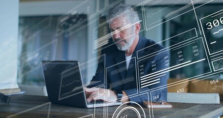 Typing man in dark blazer analyzing data on laptop and smartphone at home office, HUD overlays