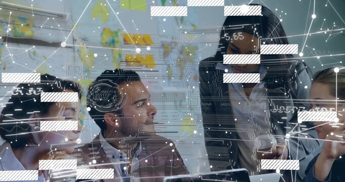 Discussing four colleagues wearing blazers reviewing data overlay in meeting room with laptops, map