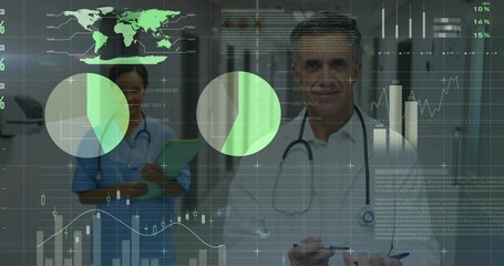 Holding tablet, doctor in white lab coat with stethoscope reviewing data overlay in hospital hall