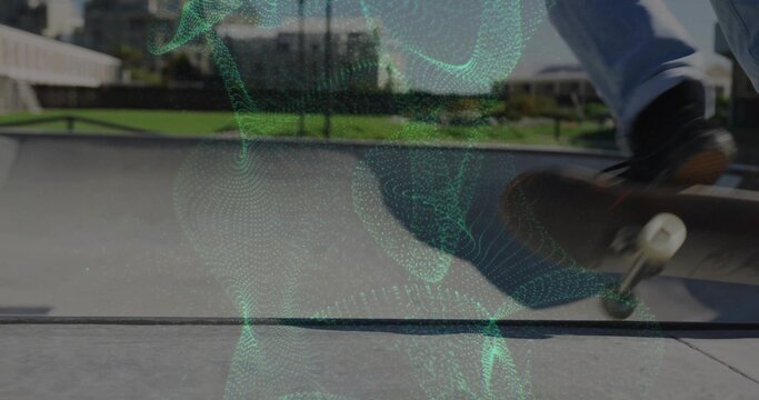 Skateboarding skater tricking board in jeans and dark skate shoes in bowl with green mesh overlay