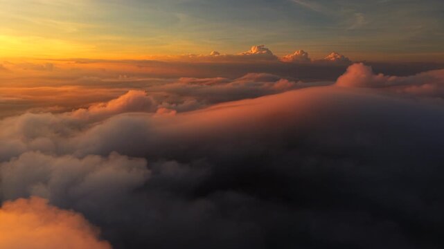 Clouds and mist at sunrise, the movement of colorful clouds in the morning, a new beginning.