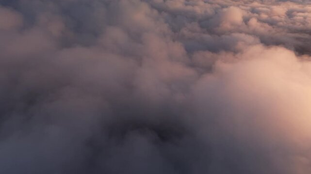 Clouds and mist at sunrise, the movement of colorful clouds in the morning, a new beginning.