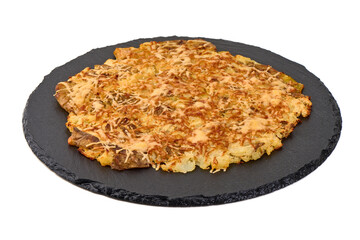 Potato Cake with Cheese on Black Slate, isolated on white background