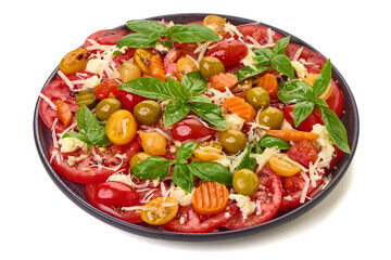 Tomato Salad with Olives, Basil and Cheese, isolated on white background