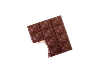 Chocolate bar with caramel, nougat and nuts filling isolated on white background.