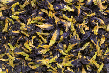 Pile of dried butterfly pea flowers for background. Top view