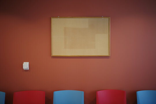 faded traces of notes on a bulletin board