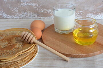 Pancakes with Honey, Milk and Eggs for a Sweet Breakfast