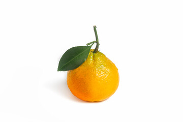 A ripe pear-shaped mandarin fruit isolated on a white background. An orange on a white background