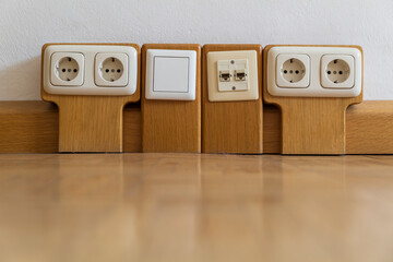 Multiple sockets with wood panelling