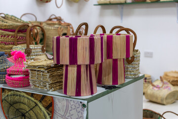 Handmade woven raffia lamps on display at the Sheikh Zayed festival 2025-2026.