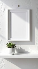 Fototapeta premium White Frame Mockup with Succulent Plant on a Shelf in a Bright Room.