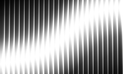 Fluid light patterns illuminate a modern space with dynamic lines and contrasts during an art installation