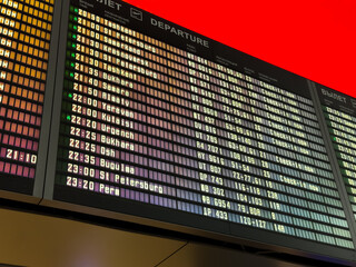 Online flight departure board at the airport. Flight schedules are displayed on the screen. Modern online board with flight numbers and departure times