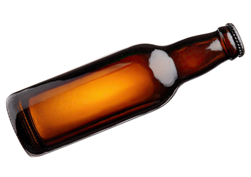 Amber bottle lying down, filled partially with golden liquid