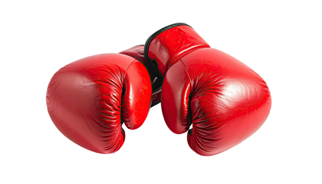 Two red boxing gloves, resting, leather surface